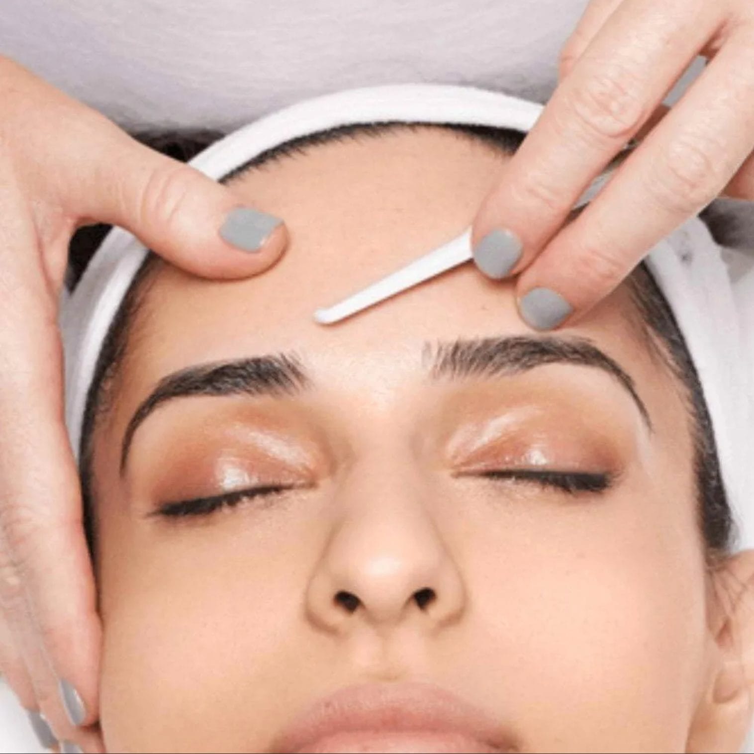 Patient getting dermaplaning treatment for softer and clearer skin