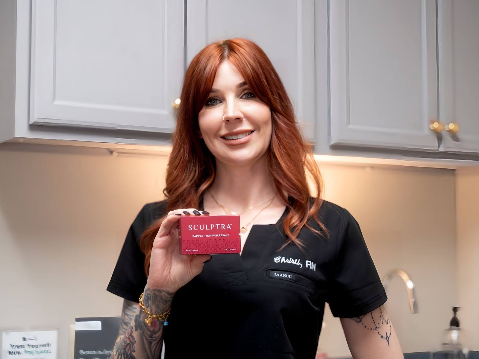 dr christi of dream med spa holding the sculptra collagen injections 