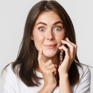 woman touching face